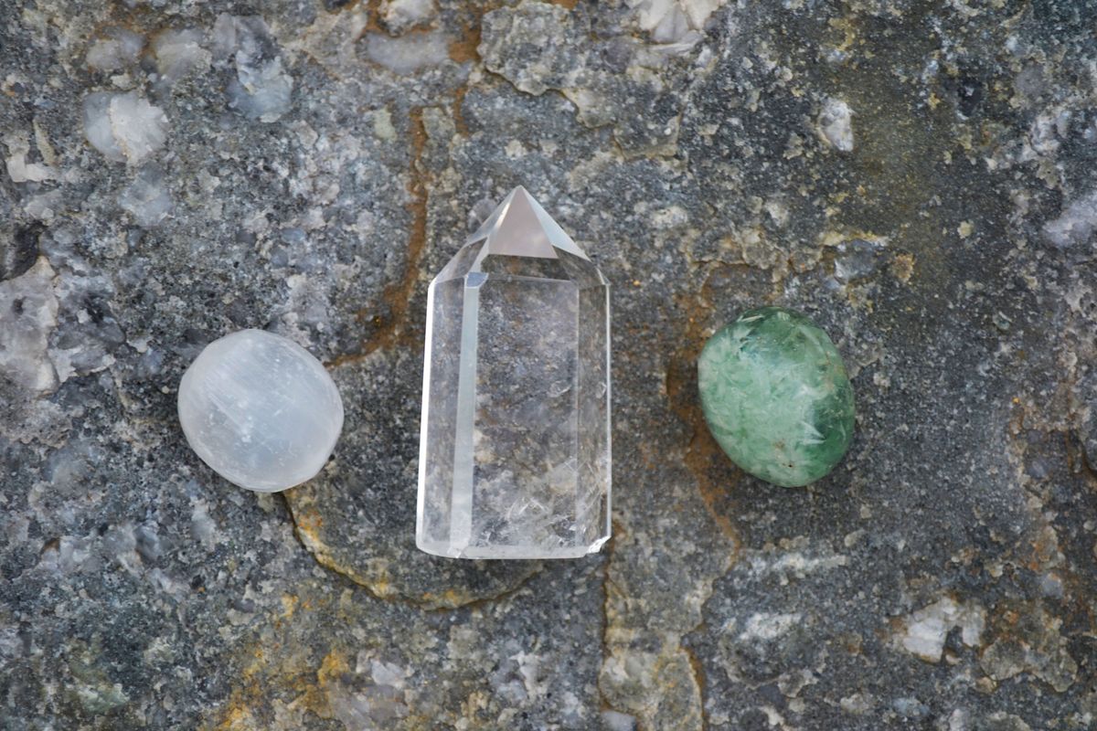 Clear and white selenite gypsum crystals, transparent to translucent, illustrating mineral diaphaneity