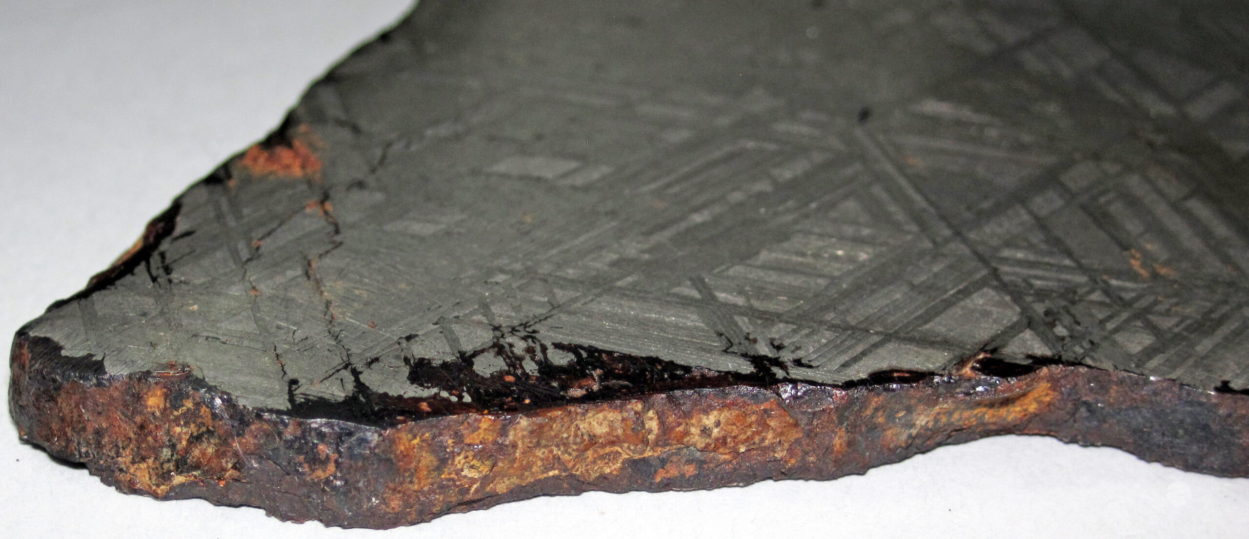 Etched slab of an iron octahedrite meteorite showing the crosshatched Widmanstatten pattern